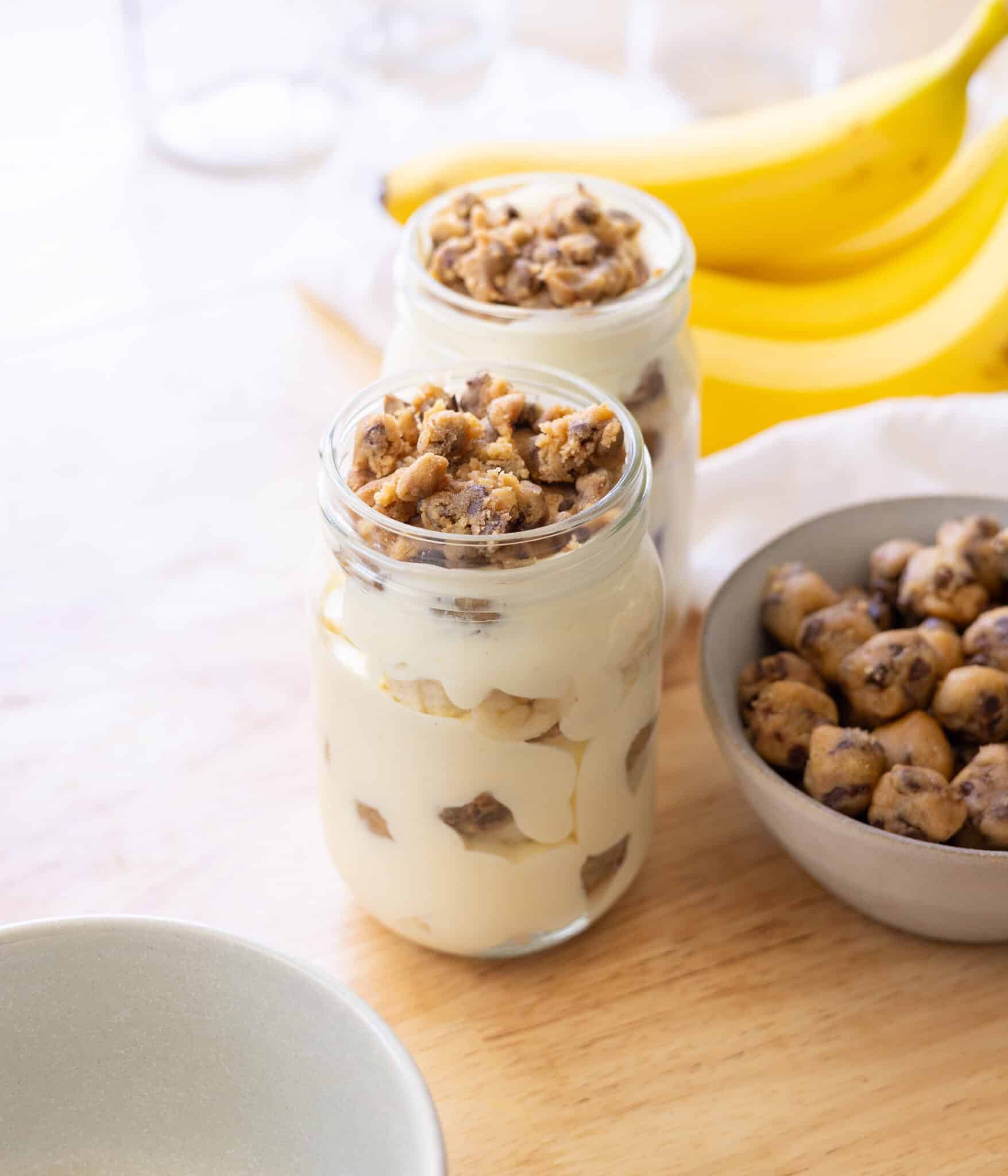 Cookie dough banana pudding in a glass jar.