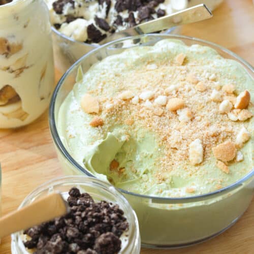 Matcha banana pudding in a glass container.
