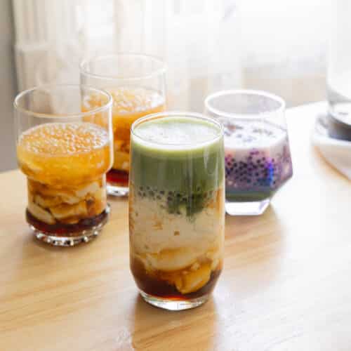 Matcha taho in a glass cup.
