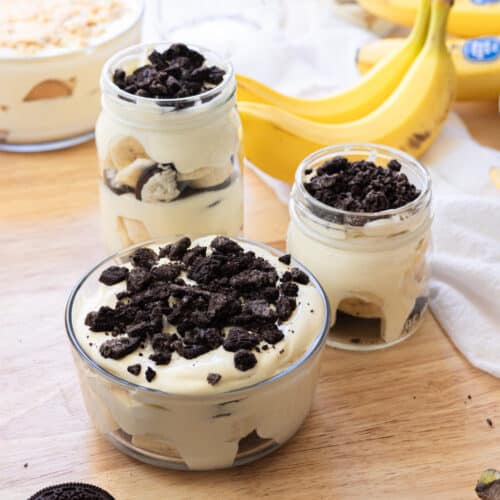 Oreo banana pudding in glass containers.