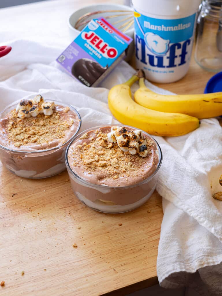 S'mores banana pudding in a glass container.