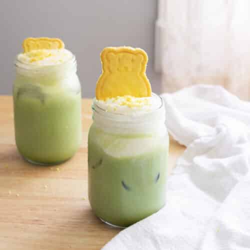 Matcha latte with banana cold foam on top.