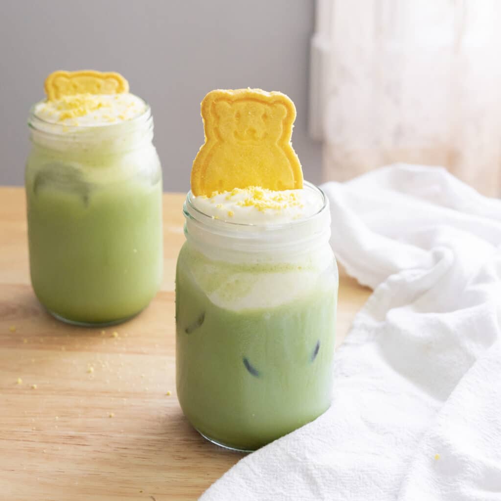Matcha latte with banana cold foam on top.
