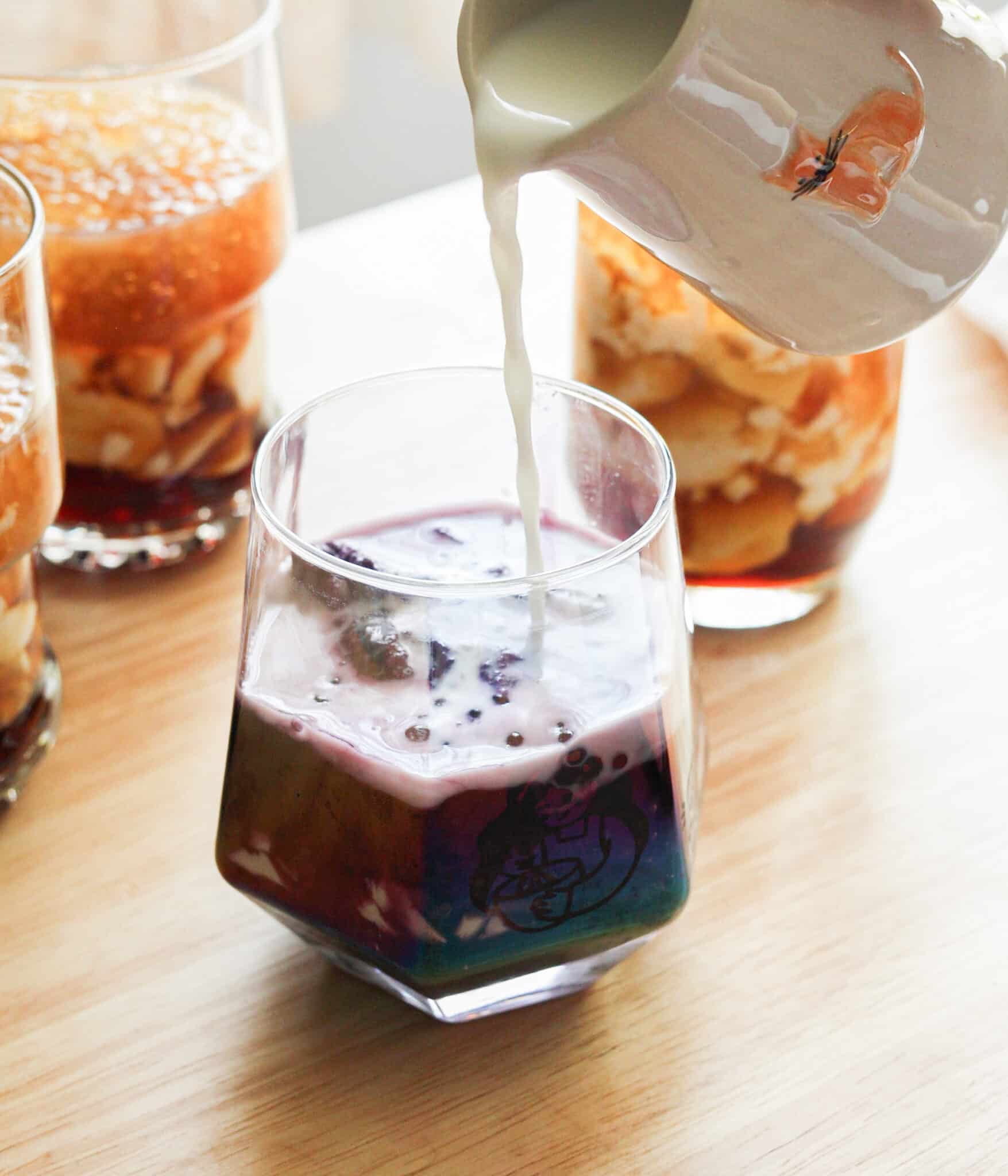 Pouring milk into ube taho.