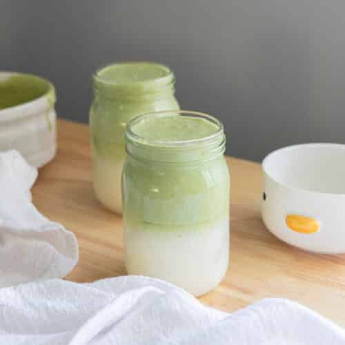 Coconut water matcha cloud drink in a mason jar.