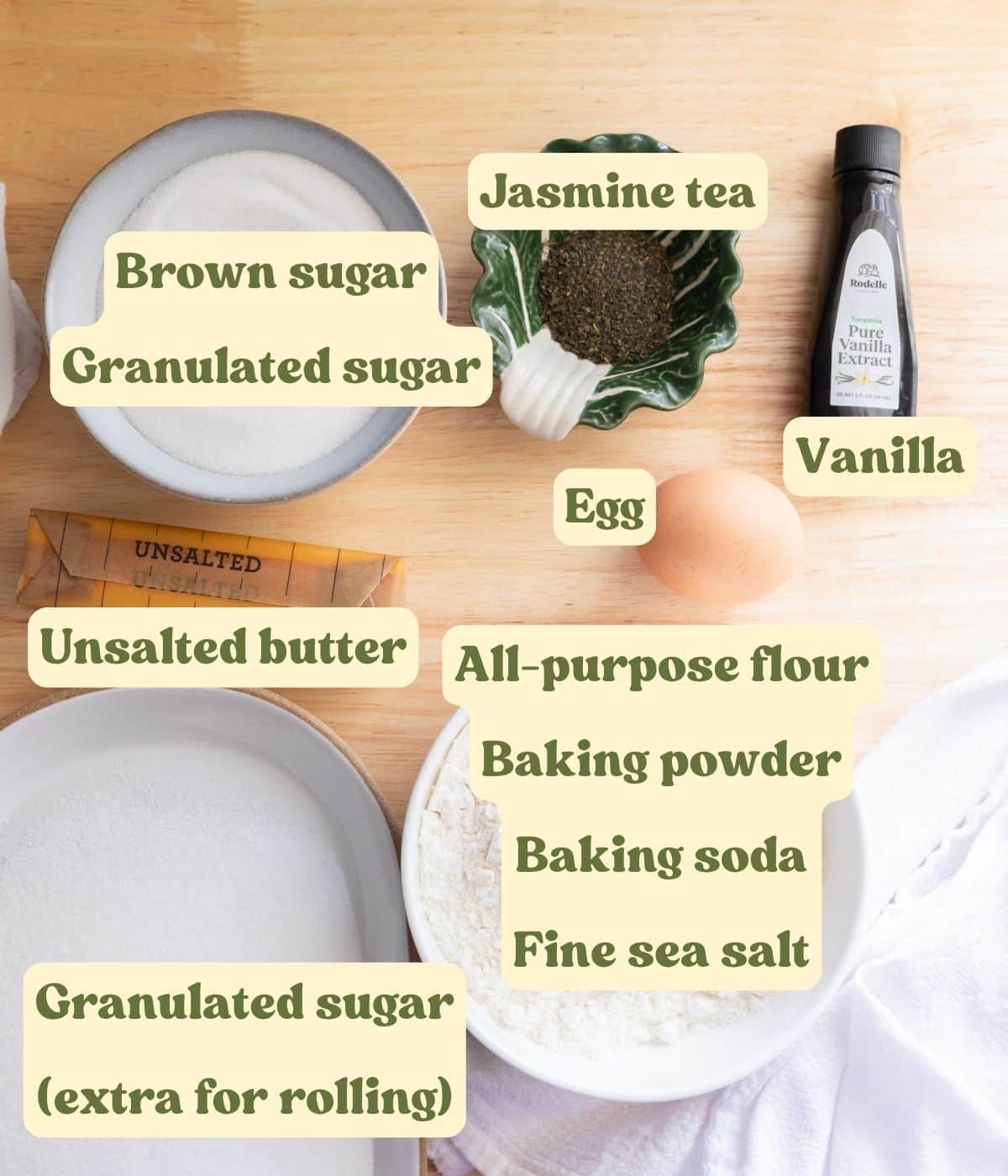 Jasmine sugar cookie ingredients laid out on a table with labels.