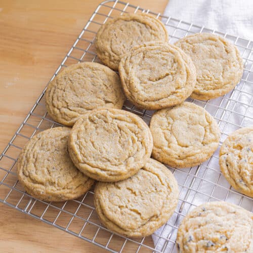 Jasmine sugar cookies cooling on a wire rack.