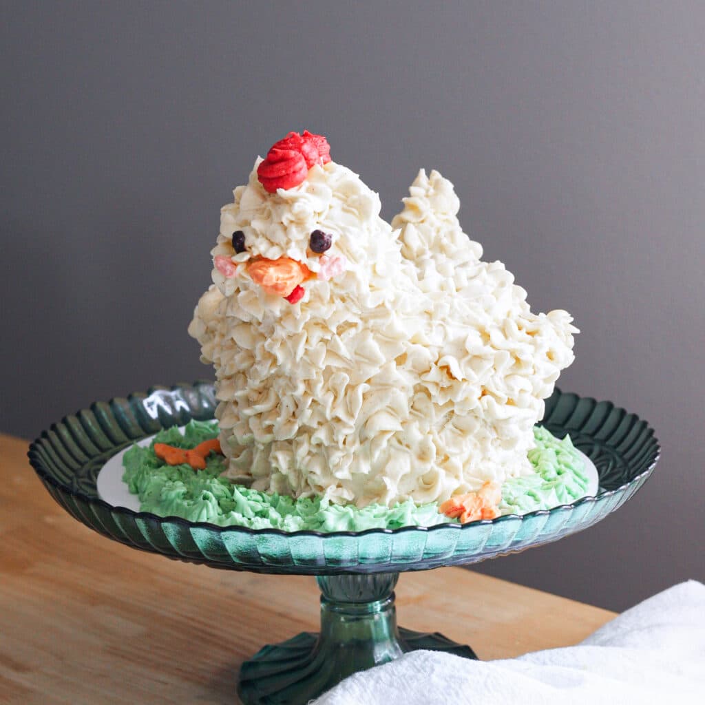 Cute chicken cake on a green cake stand.