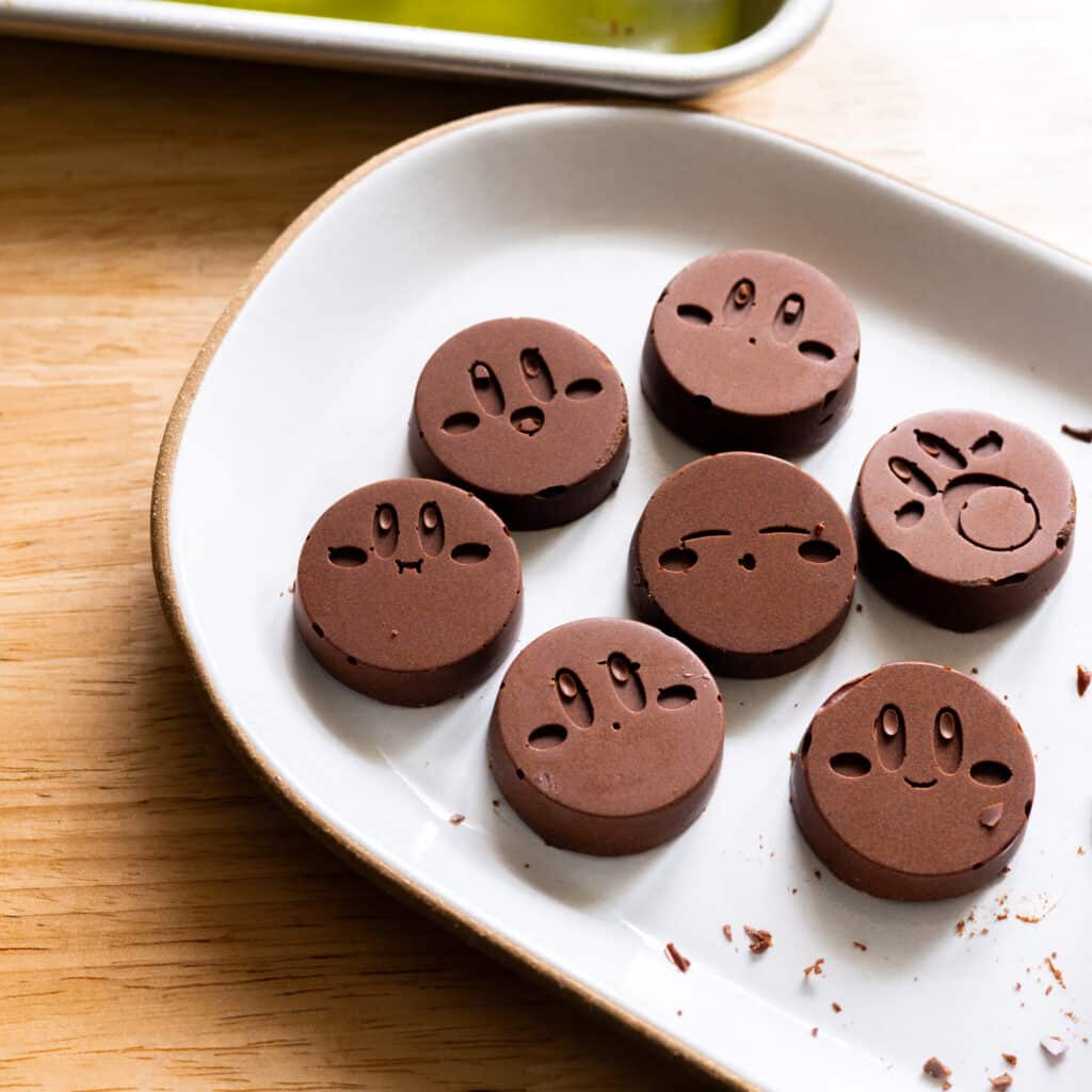 Homemade kirby shaped chocolate on a white plate.
