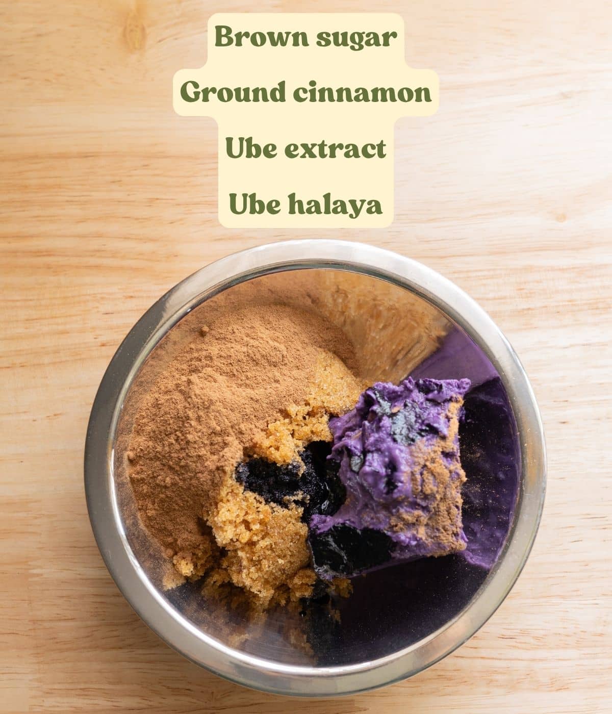 Labeled ube cinnamon roll filling ingredients laid out on a table.