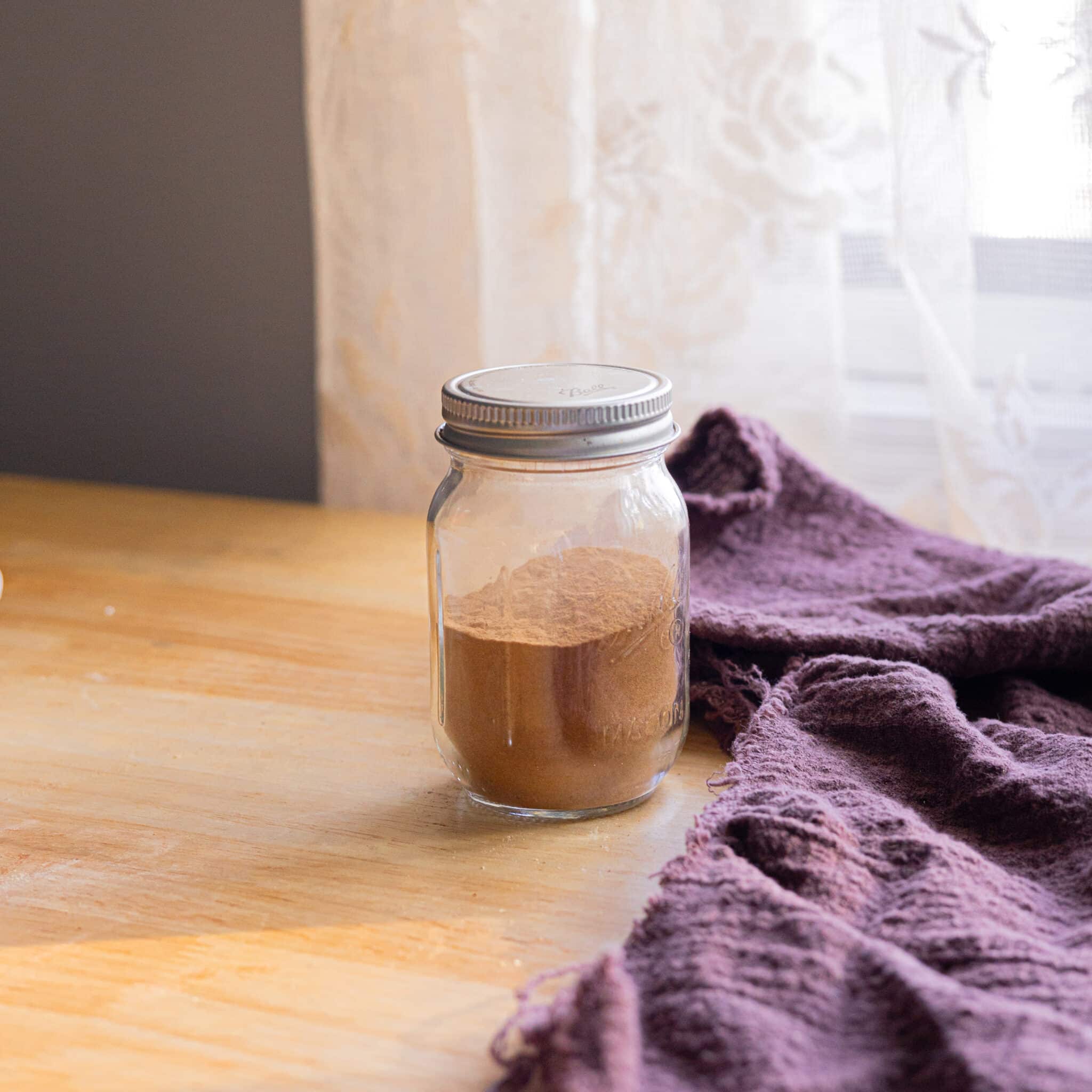 Apple pie spice mix ingredients in a little jar.