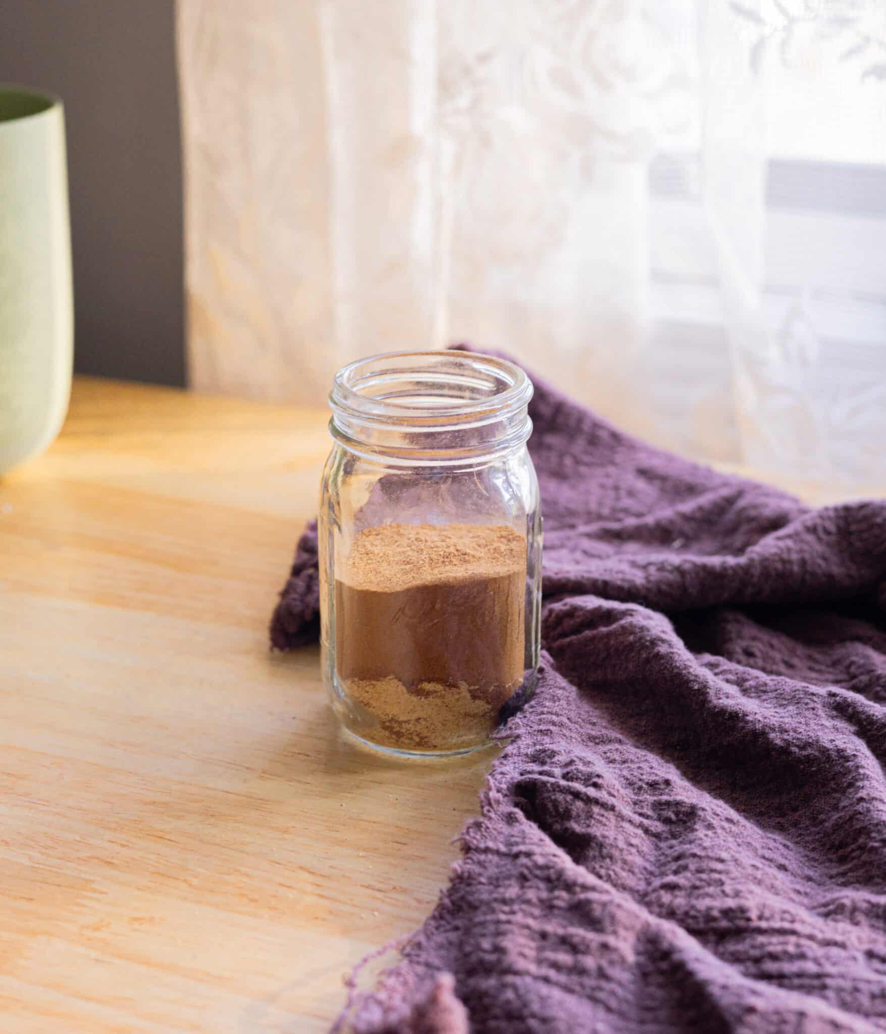 Apple pie spice ingredients in a jar, ready to be mixed!