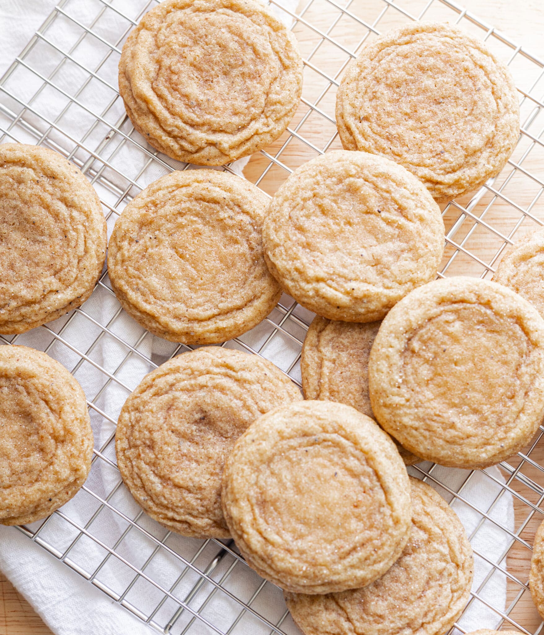 Chai sugar cookies on a wire rack.
