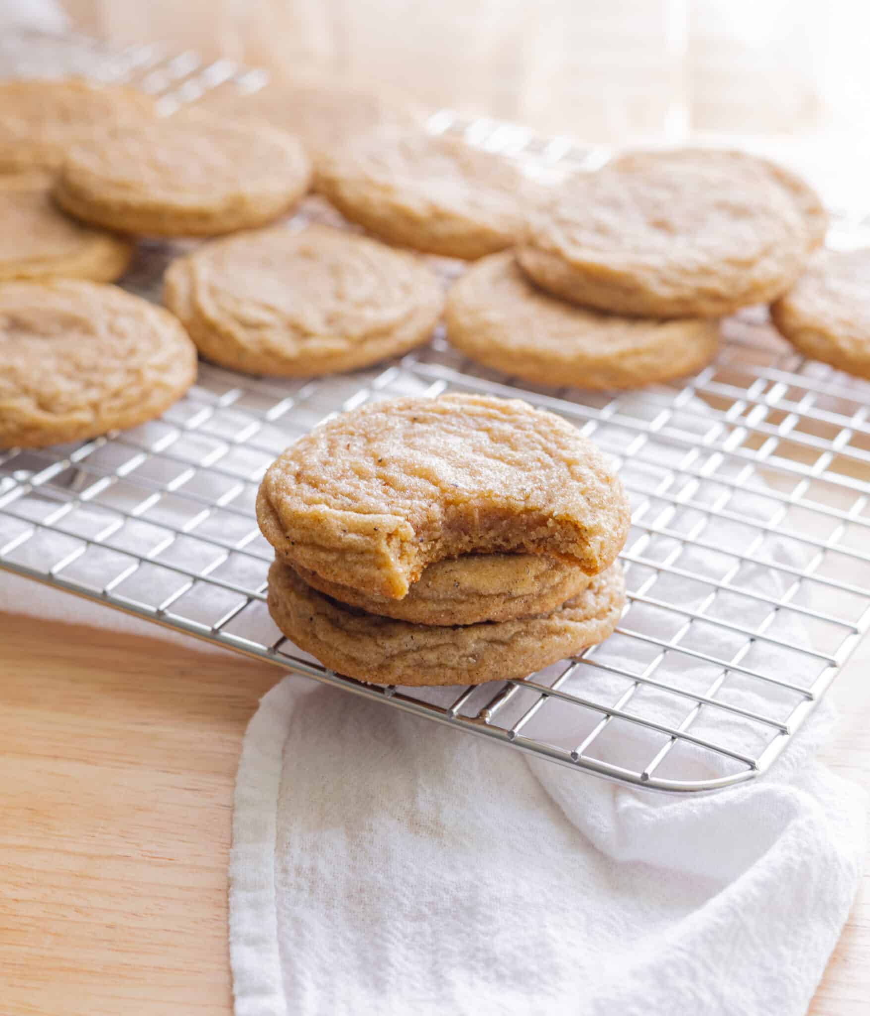 Chai sugar cookies on a wire rack.