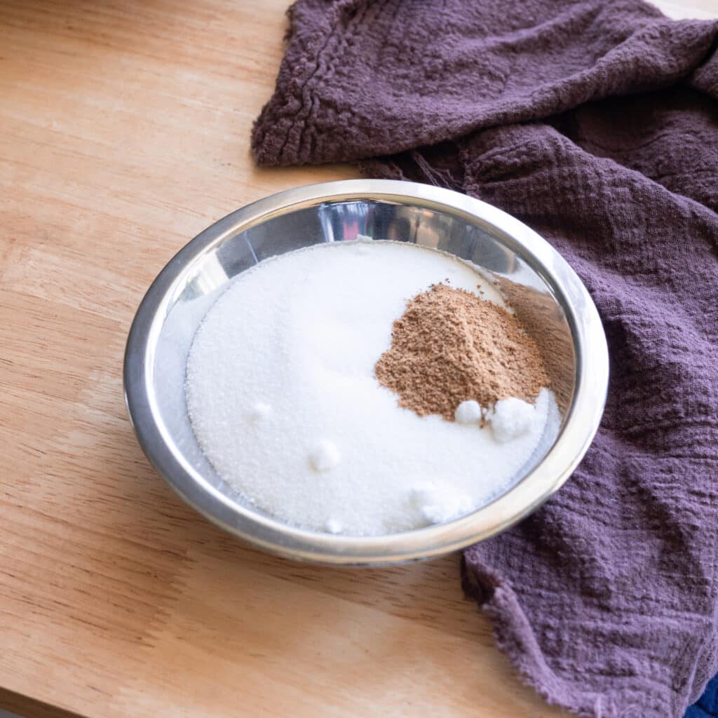 Chai sugar in a steel bowl.