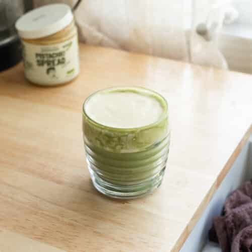 Matcha latte topped with creamy pistachio cold foam.