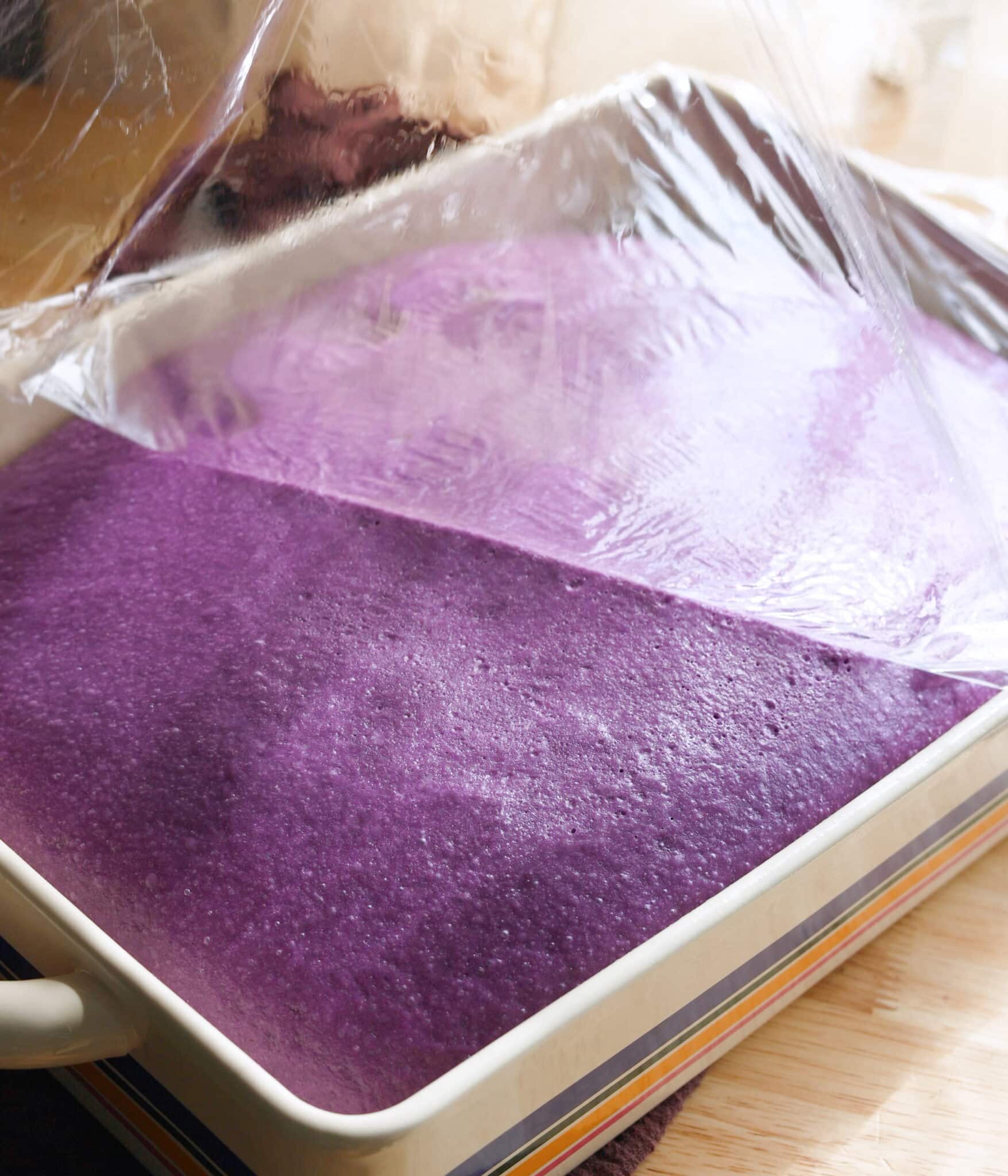 Ube cinnamon roll dough after first proof.