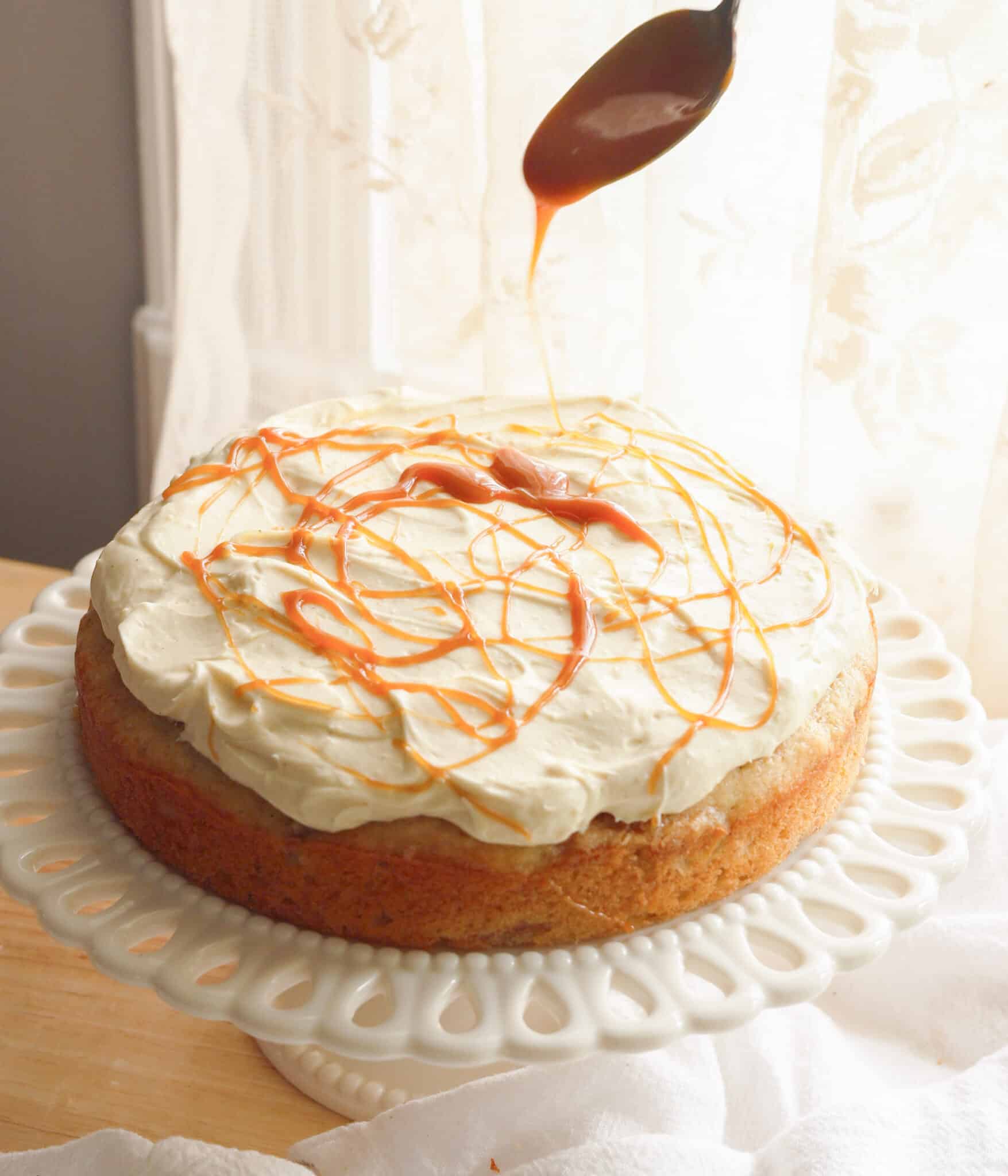 Drizzling salted caramel on top of banana cake.