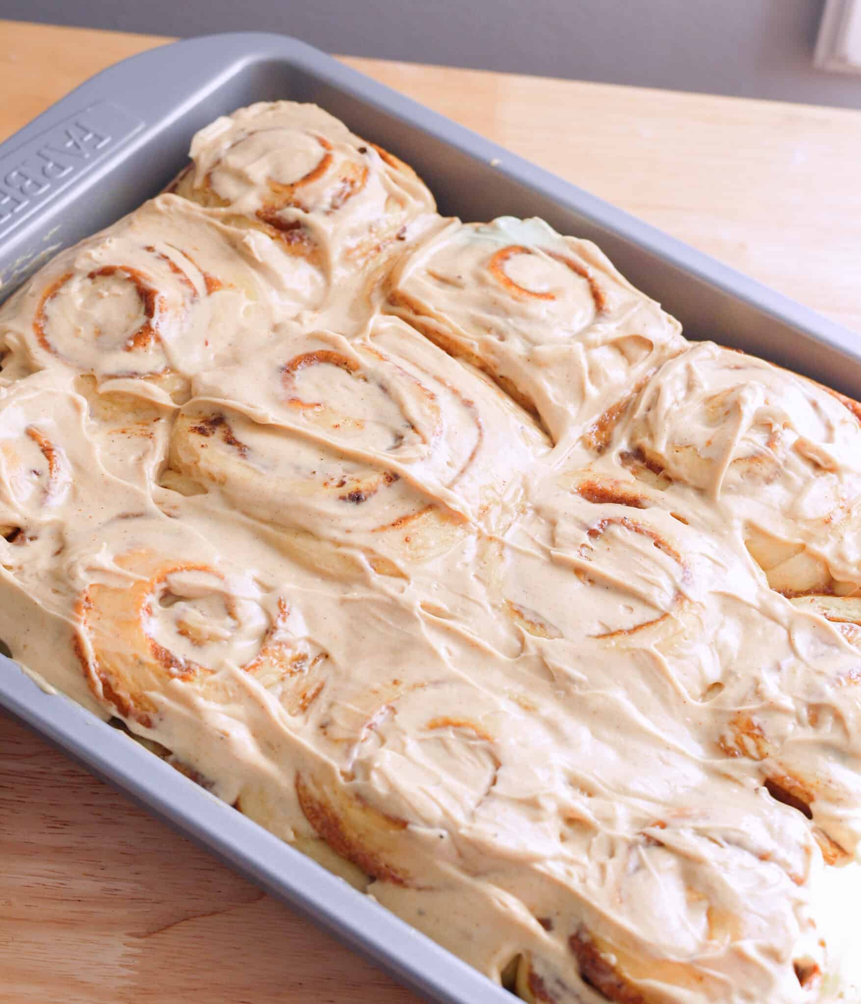 Chai cinnamon rolls in 9x13 baking pan.