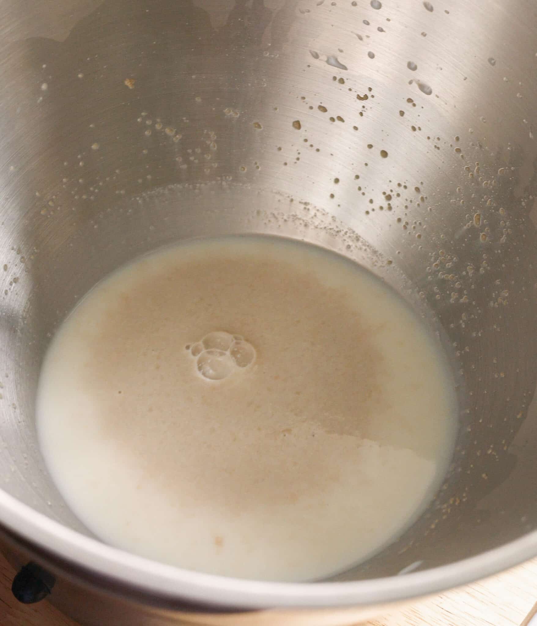 Proofed yeast in sweetened milk mixture.
