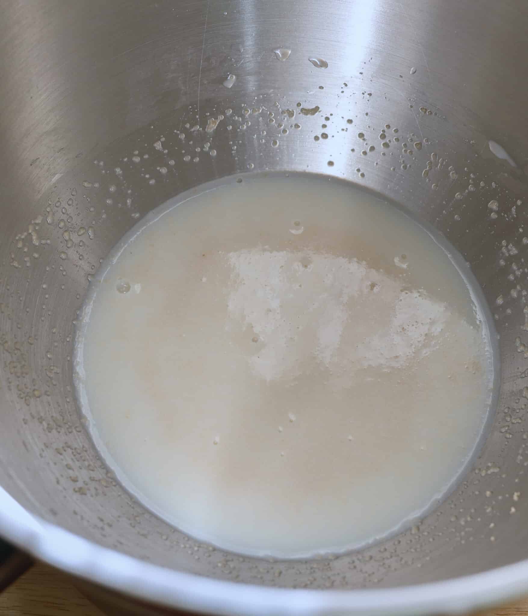 Proofed yeast in milk and brown sugar.