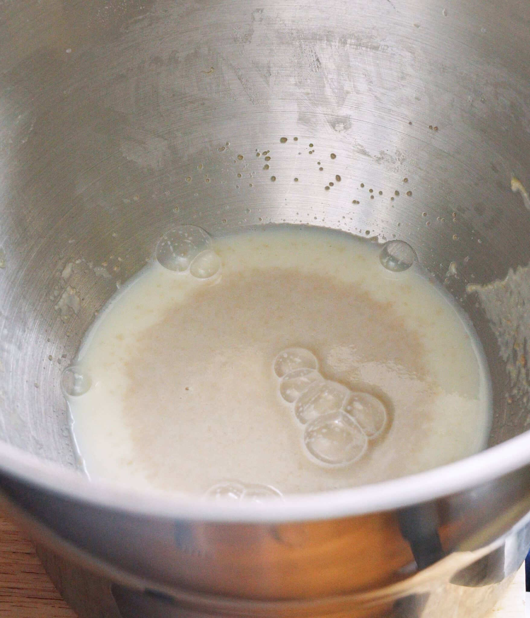 Proofed yeast in sweetened milk mixture.